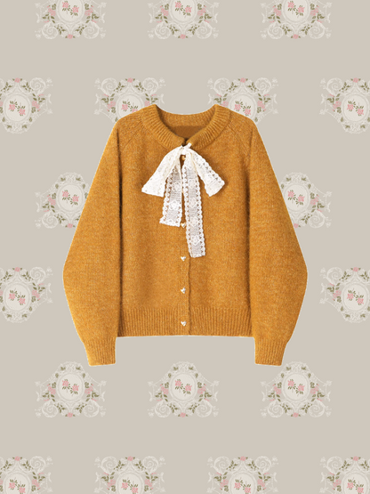 Front Ribbon Heart Button Cardigan/フロントリボンハートボタンカーディガン